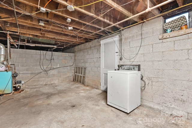 unfinished basement featuring washer / clothes dryer