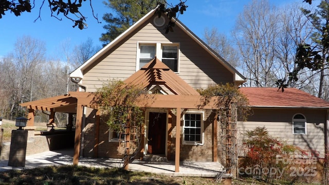 view of front of house with a patio