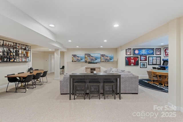 bar with carpet, baseboards, and recessed lighting