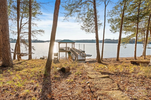 view of dock with a water view and boat lift