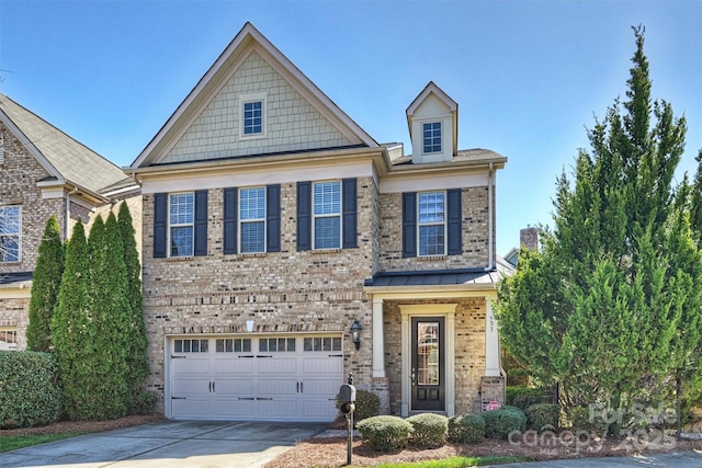 craftsman inspired home featuring brick siding, a standing seam roof, concrete driveway, and a garage