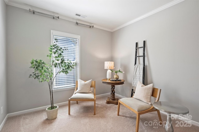 living area featuring visible vents, plenty of natural light, carpet floors, and crown molding