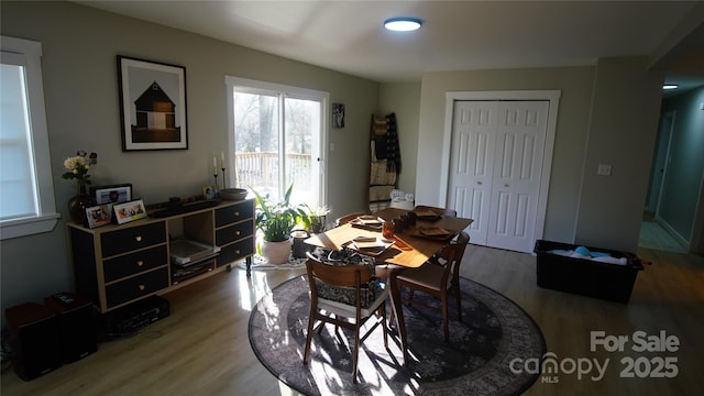 dining room with wood finished floors