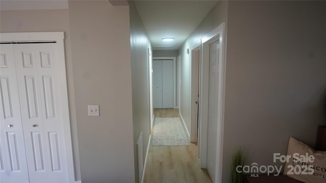 hall featuring light wood finished floors