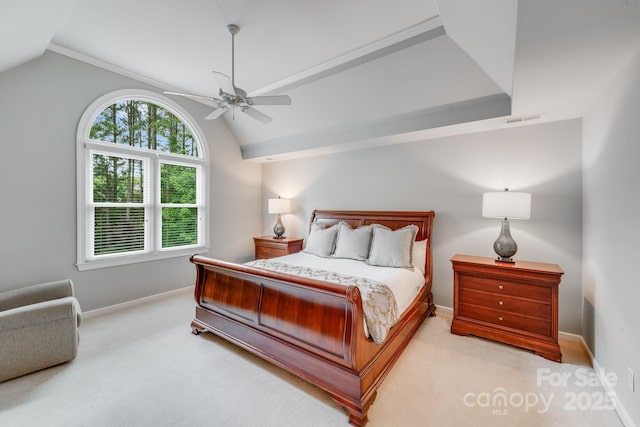 bedroom featuring light carpet, baseboards, visible vents, and lofted ceiling