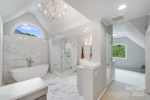 bathroom featuring a healthy amount of sunlight, visible vents, marble finish floor, and a marble finish shower