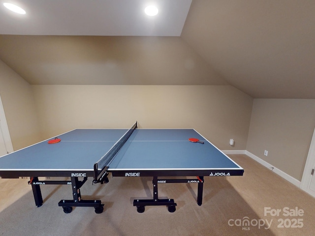 game room featuring lofted ceiling, carpet floors, and baseboards