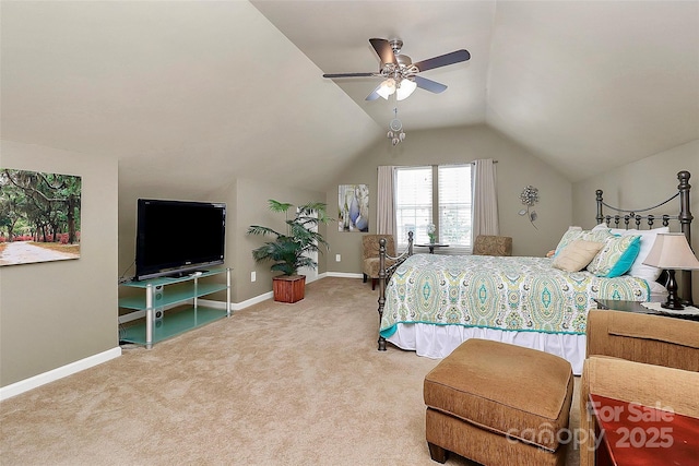 carpeted bedroom with lofted ceiling, ceiling fan, and baseboards