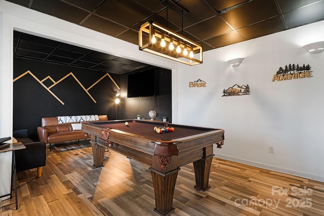 rec room featuring baseboards, wood finished floors, and pool table