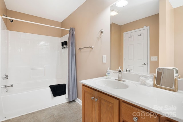 bathroom featuring tile patterned floors, visible vents, vanity, baseboards, and shower / tub combo