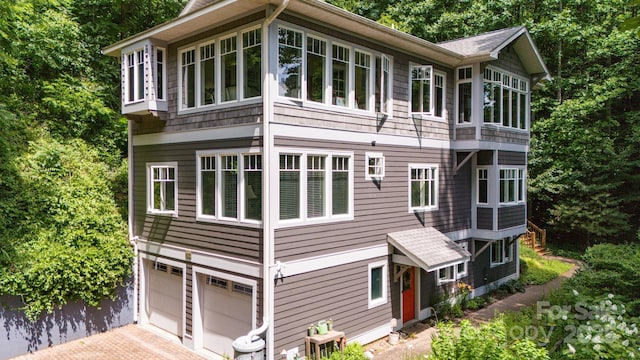 exterior space featuring a garage and driveway