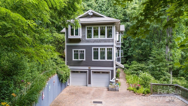 322 Crestview Dr, Black Mountain, NC 28711 - view of front of home with decorative driveway and a garage