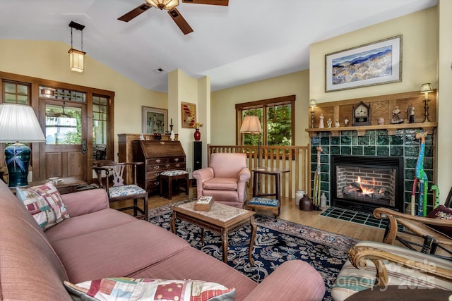 322 Crestview Dr, Black Mountain, NC 28711 - living area with wood finished floors, visible vents, a ceiling fan, lofted ceiling, and a fireplace