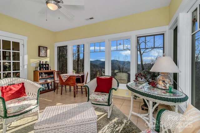 322 Crestview Dr, Black Mountain, NC 28711 - sunroom featuring visible vents, a mountain view, and a ceiling fan