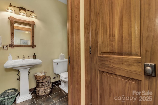 322 Crestview Dr, Black Mountain, NC 28711 - bathroom featuring tile patterned floors, baseboards, and toilet