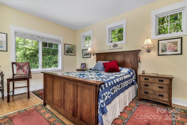 322 Crestview Dr, Black Mountain, NC 28711 - bedroom with baseboards and wood finished floors