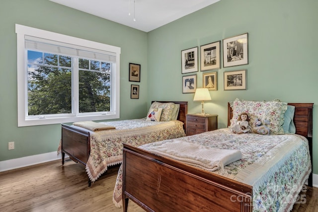 322 Crestview Dr, Black Mountain, NC 28711 - bedroom featuring baseboards and wood finished floors
