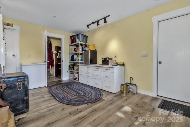 322 Crestview Dr, Black Mountain, NC 28711 - miscellaneous room with track lighting, baseboards, and light wood finished floors