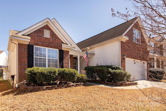 view of front of home featuring concrete driveway, brick siding, and an attached garage