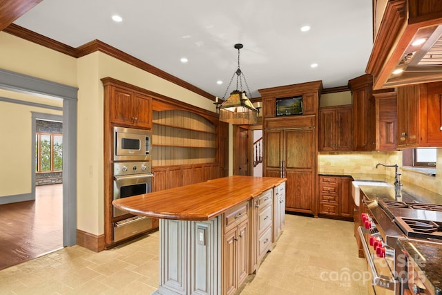 1245 Laurel Ln, Blowing Rock, NC 28605 - kitchen featuring stainless steel appliances, ornamental molding, a chandelier, a sink, and recessed lighting