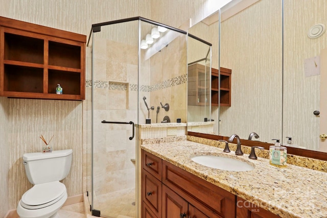 1245 Laurel Ln, Blowing Rock, NC 28605 - bathroom featuring wallpapered walls, vanity, toilet, and a stall shower