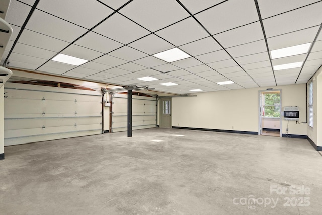 1245 Laurel Ln, Blowing Rock, NC 28605 - garage featuring heating unit and baseboards