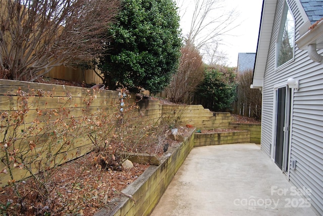 view of patio with fence