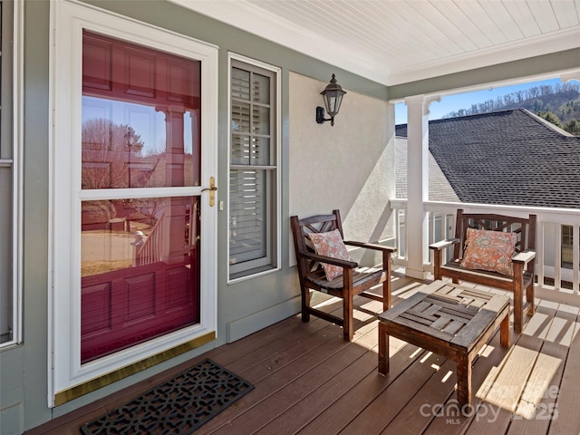 doorway to property with a porch