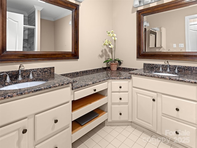 full bath featuring a stall shower, tile patterned flooring, vanity, and crown molding