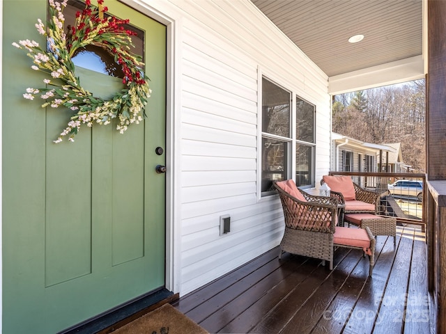 wooden terrace featuring a porch