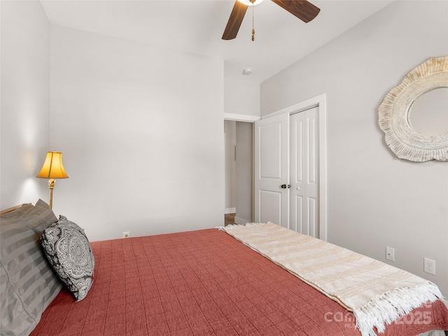 bedroom featuring a ceiling fan and a closet