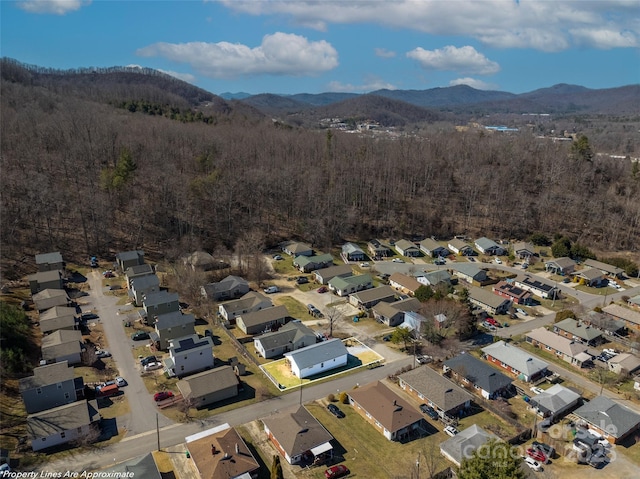 bird's eye view with a residential view, a mountain view, and a forest view