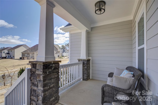 balcony with a porch and a residential view