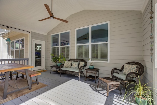 deck with ceiling fan and outdoor lounge area