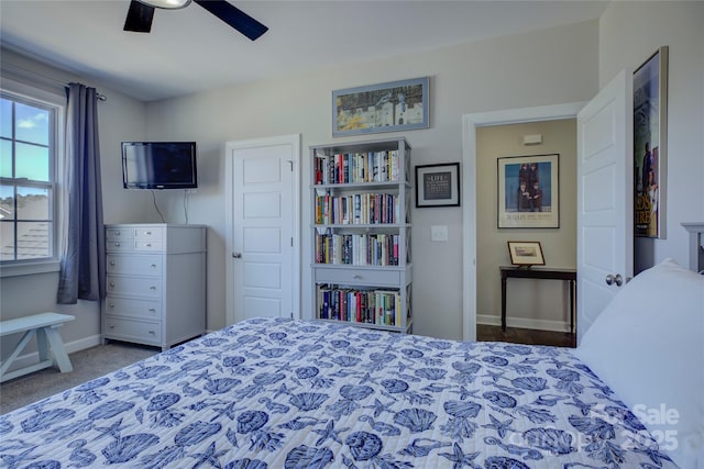 bedroom featuring carpet floors, ceiling fan, and baseboards