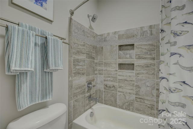 full bath with toilet and shower / tub combo with curtain