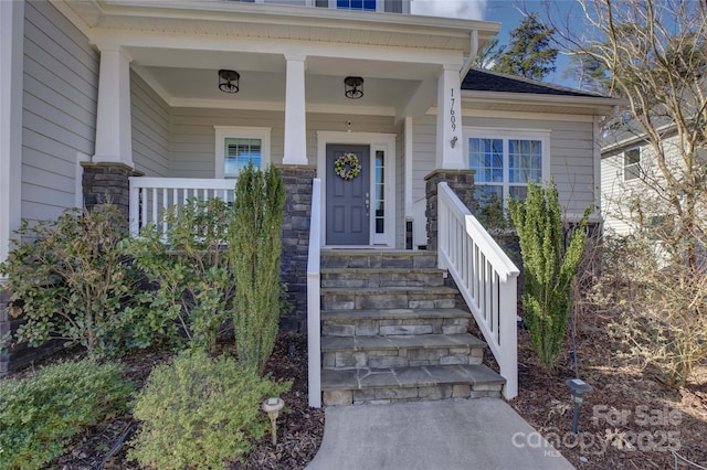 17609 Caddy Ct, Charlotte, NC 28278 - view of exterior entry featuring a porch
