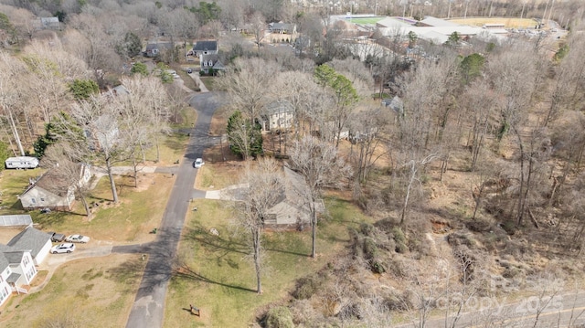 birds eye view of property with a residential view