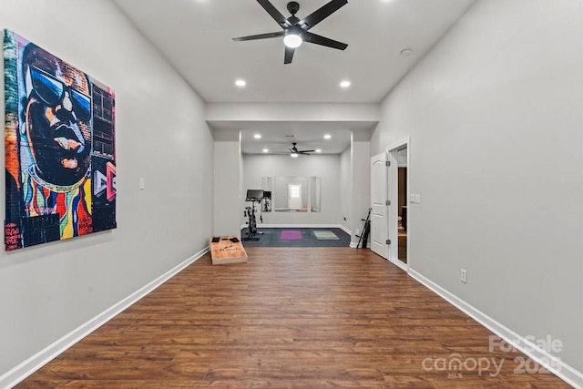 exercise area featuring recessed lighting, wood finished floors, baseboards, and ceiling fan