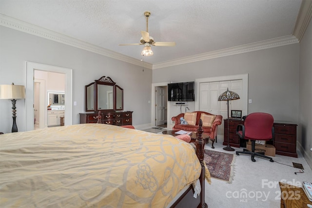 carpeted bedroom with baseboards, a textured ceiling, and crown molding