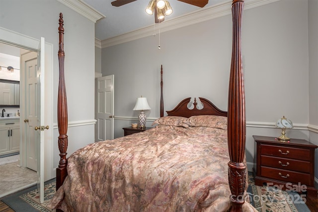 bedroom featuring a sink, ornamental molding, and a ceiling fan