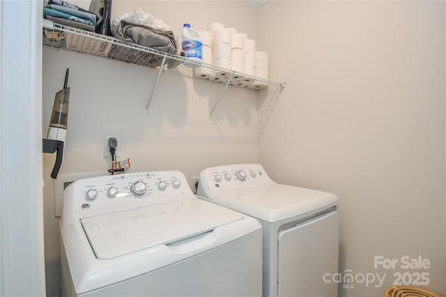 laundry area featuring laundry area and washing machine and clothes dryer