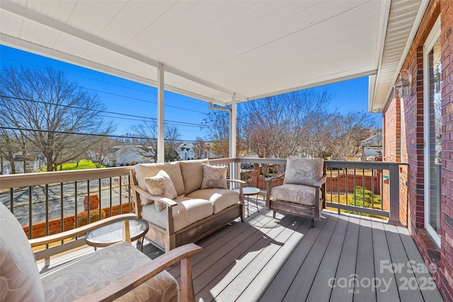 deck with an outdoor hangout area