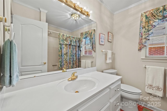 bathroom with toilet, vanity, a shower with shower curtain, and ornamental molding