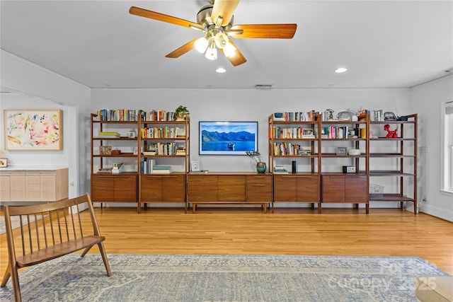 sitting room featuring recessed lighting, light wood-style flooring, and a ceiling fan