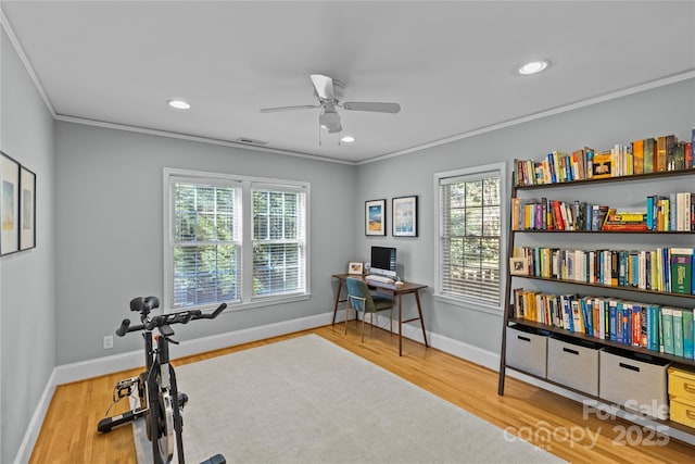 exercise room featuring recessed lighting, visible vents, crown molding, and wood finished floors