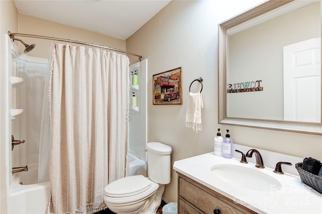 full bathroom featuring shower / bath combo, vanity, and toilet