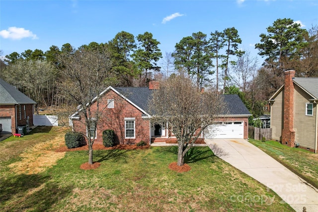 ranch-style house with driveway, brick siding, an attached garage, fence, and a front yard