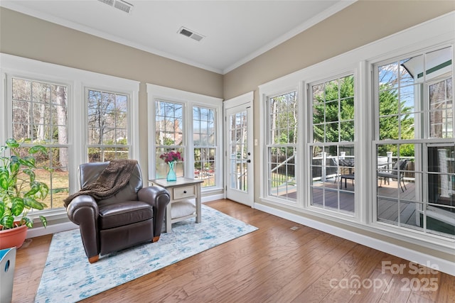 sunroom / solarium featuring visible vents