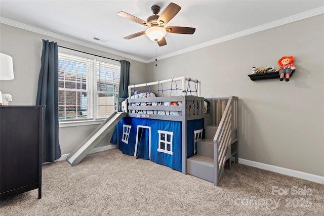 bedroom with carpet, visible vents, ornamental molding, and baseboards